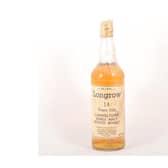The bottle of Longrow 14 Year Old, thought to have been bottled in the early 1980s, was bought by father and son connoisseurs for just £14. It went under the hammer for a stunning £1,400.
