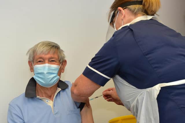 David Sanderson is given first covid vaccine by practice nurse Fiona Amos at Market Harborough Medical Centre.
PICTURE: ANDREW CARPENTER