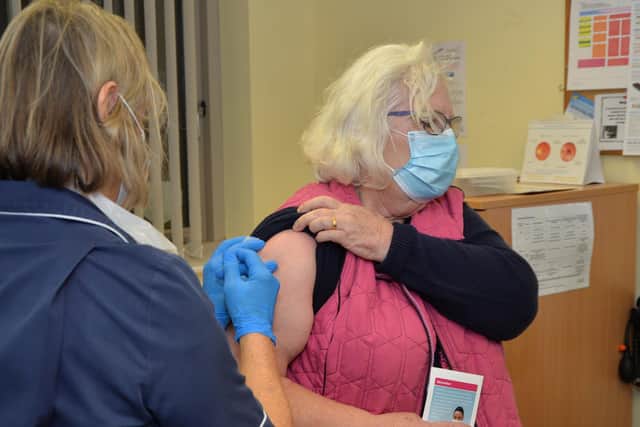 Susan Sanderson is given second covid vaccine by practice nurse Debbie Warner at Market Harborough Medical Centre.
PICTURE: ANDREW CARPENTER