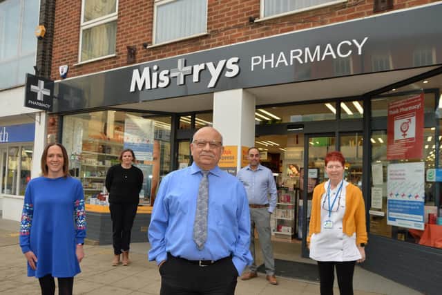 Shantila Mistry of Mistrys Pharmacy with some of the staff on the High Street in Market Harborough.
PICTURE: ANDREW CARPENTER