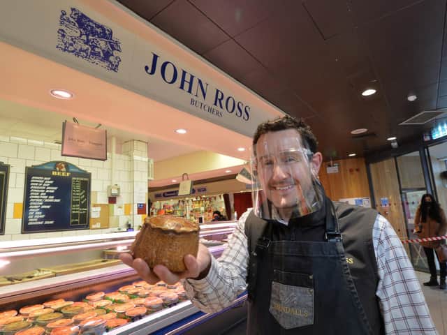 Kris Moore of John Ross & Sons inside Market Harborough indoor market.
PICTURE: ANDREW CARPENTER