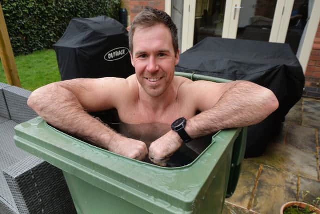 Dr Scott Castell from Foxton has been getting into a wheelie bin of ice cold water everyday this month, to raise money for CALM. Photo by Andrew Carpenter.