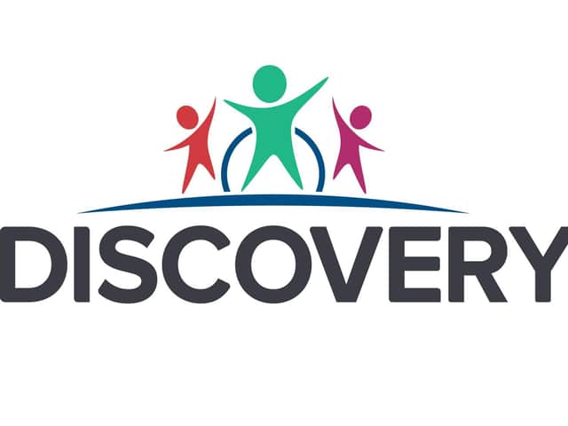 Discovery Trust logo.
