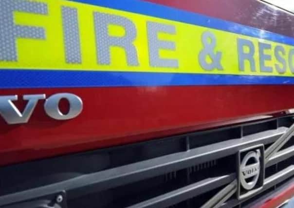 A man suffered burns to his hands after a discarded cigarette is believed to have sparked a fire at his home in Desborough.