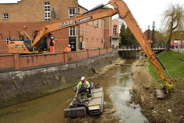 Cleaning the River Welland has started again after flooding stopped work earlier this month.
PICTURE: ANDREW CARPENTER
