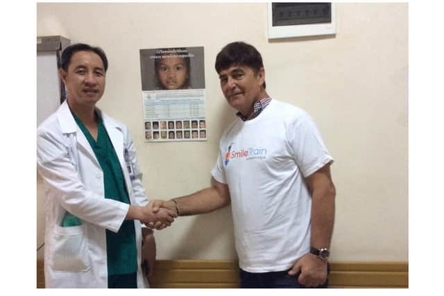 Peter James with Dr Chay at a children's hospital in Vientiane, Laos.