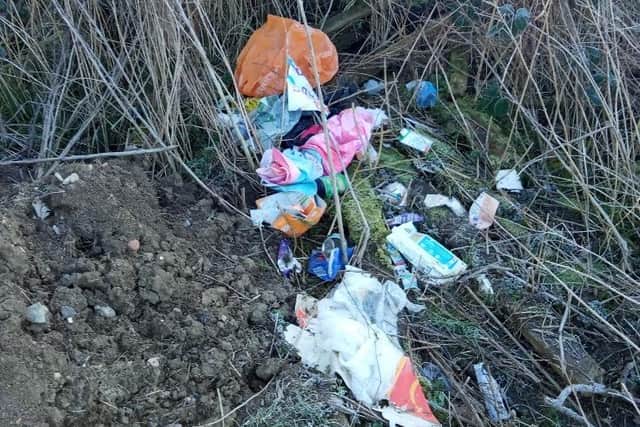 A disgusting pile of rubbish – including jars of rotting food – has been dumped in beautiful countryside near Market Harborough.
