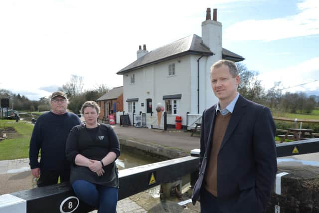 Gary Hives and Kelly Foster of Top Lock Coffee Shop with Neil O'Brien MP, just after they were told his lease would not be extended. Now it seems the Canal & River Trust might be changing their minds.
PICTURE: ANDREW CARPENTER