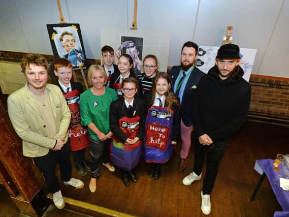 Pictured from left, artist Ant Hamlyn, Alison Hamlyn Young Arts Coordinator , Daniel Page Head of Art and artist Doug Gillen during the event at Robert Smyth Academy.
PICTURE: ANDREW CARPENTER