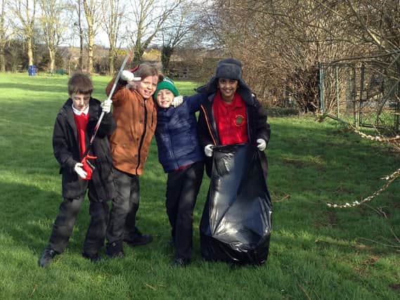 Cottingham Schoolchildren planting bulbs in the Middleton Pocket Park, as part of their recent Values Day