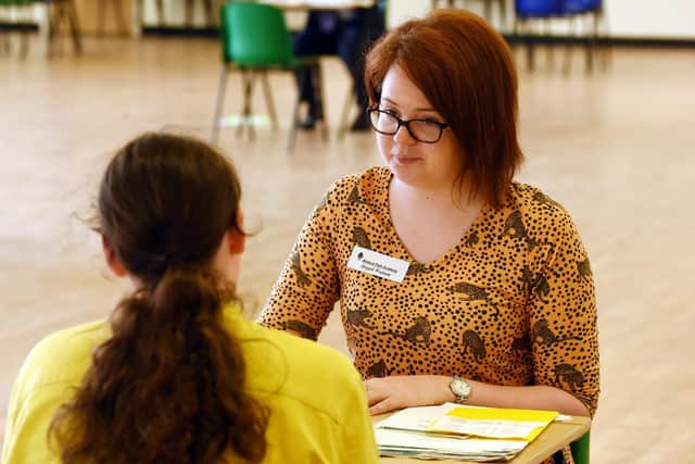 Abigail Wattam speaks to one of the Welland Park Academy students during the careers day.
PICTURE: ANDREW CARPENTER