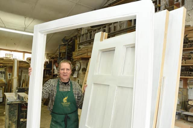 Richard with a door frame he's working on.
PICTURE: ANDREW CARPENTER