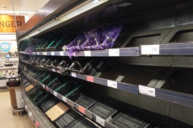 Empty shelves in Sainsbury's