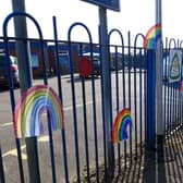 Pupils at a Harborough district school are going rainbow crazy as they shine a ray of dazzling sunshine on their village.