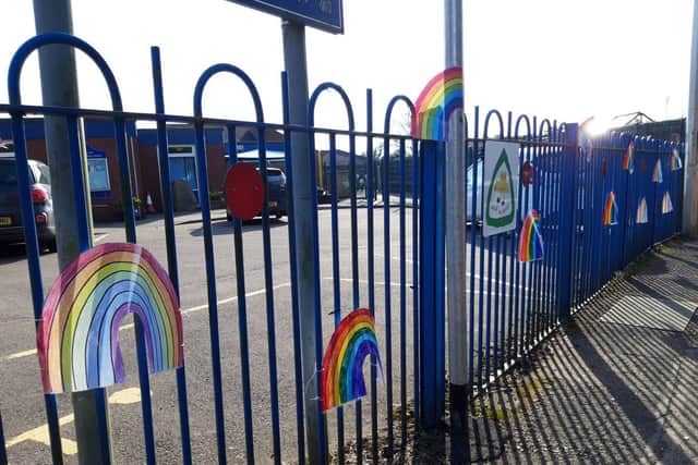 Pupils at a Harborough district school are going rainbow crazy as they shine a ray of dazzling sunshine on their village.