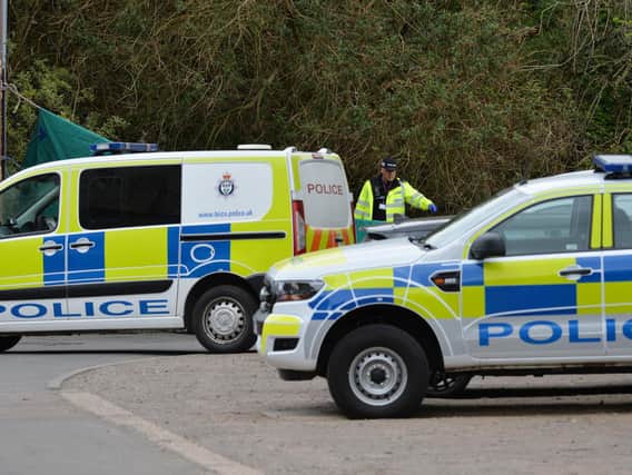Police at the scene of the fatal crash. Photo by Andrew Carpenter.