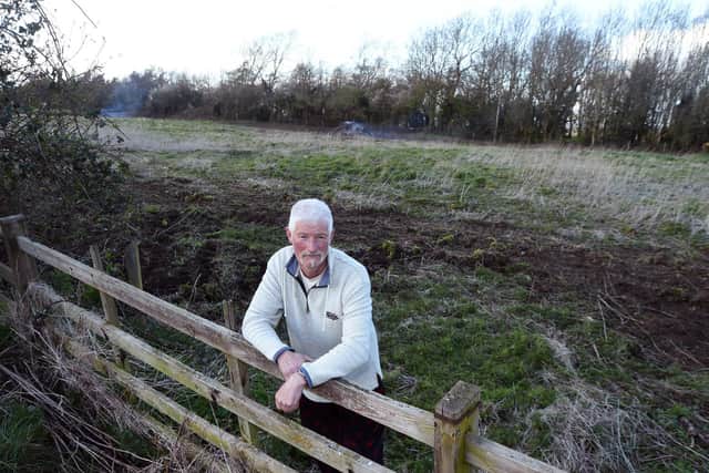 Resident Tim Bourne at the site off The Ridgeway where work has started to clear bushes and is the feeding territory for barn owls and lots of wildlife.
PICTURE: ANDREW CARPENTER