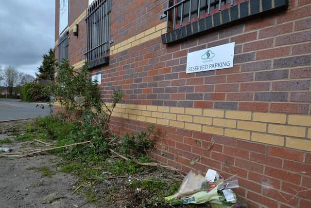Flowers left at the scene where Paige Howard died.
PICTURE: ANDREW CARPENTER