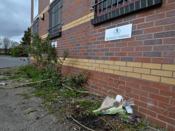 Flowers left at the scene where Paige Howard died.
PICTURE: ANDREW CARPENTER