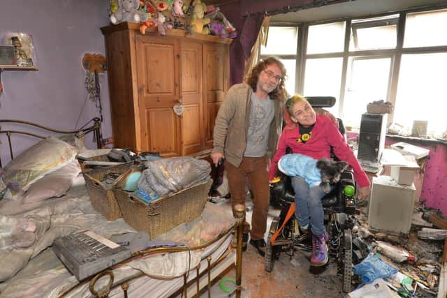 Paul Barber and Bonnie Chamberlain in their smoke damaged bedroom.
PICTURE: ANDREW CARPENTER