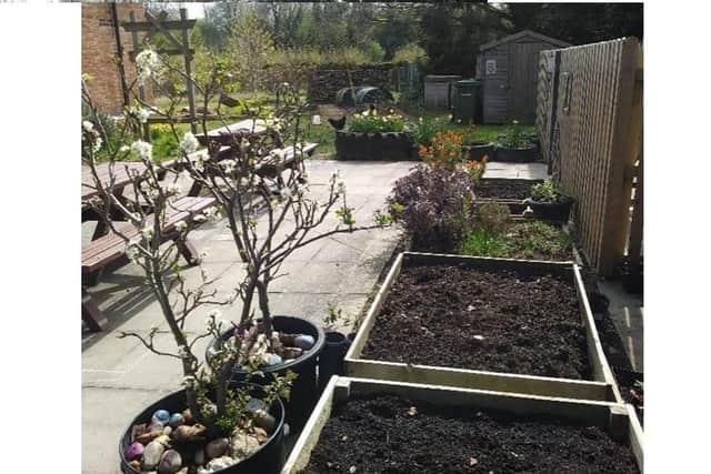 Children are rolling up their sleeves and tidying raised beds, replanting strawberry troughs and sowing seeds for salads, vegetables and ornamental flowers.