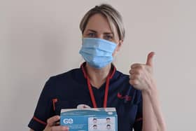 Jodie, deputy director of nursing at Myton Hospice, Warwick, wearing a mask donated by Joules.