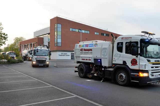 Craig Davies of CJ Sweepers leads the convoy past St Luke's Treatment Centre.
PICTURE: ANDREW CARPENTER