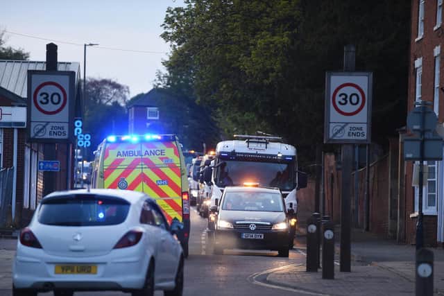 The convoy gives way to an ambulance.
PICTURE: ANDREW CARPENTER