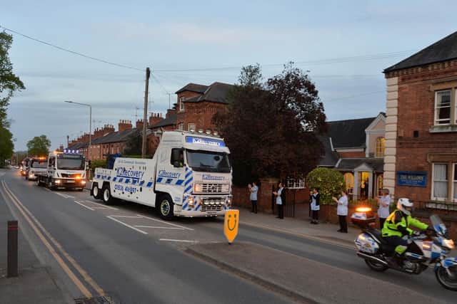 Staff at the Willows Nursing Home applaud the convoy.
PICTURE: ANDREW CARPENTER