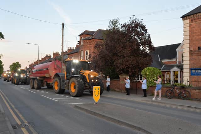 Men, women and children stood, clapped and cheered as the 60-vehicle cavalcade wound its way through Harborough, Lubenham and Marston Trussell. Photo by Andrew Carpenter.