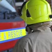 A man was badly burned on his legs and hands after fire in a workshop at his home in a village near Market Harborough.