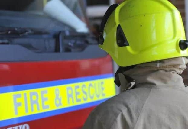 A man was badly burned on his legs and hands after fire in a workshop at his home in a village near Market Harborough.