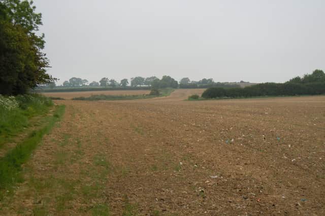 The field on the outskirts of Market Harborough that has been turned into an ugly massive tip.