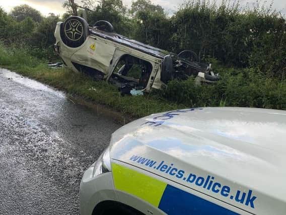 The man, who is in his 20s, had to be cut free by firefighters after his white Mercedes ended up on its roof on a grass verge at Stoughton.