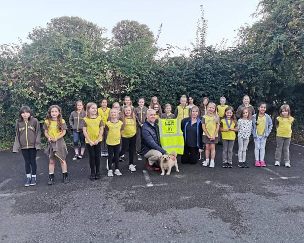 The Harborough branch of McDonald's has donated more hi-viz vests to the South Leicestershire Litter Wombles community group - and 20 girls from the 5th Market Harborough Brownies joined forces with other volunteers and Geoff Walker from the Wombles in Litter Education to collect litter in and around Market Harborough town centre.