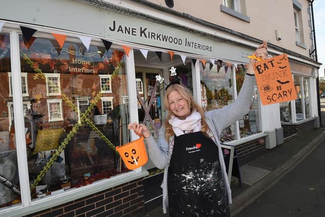 Jane Kirkwood outside her shop who is taking part in the Lutterworth town centre scavenger hunt until October 31.
PICTURE: ANDREW CARPENTER