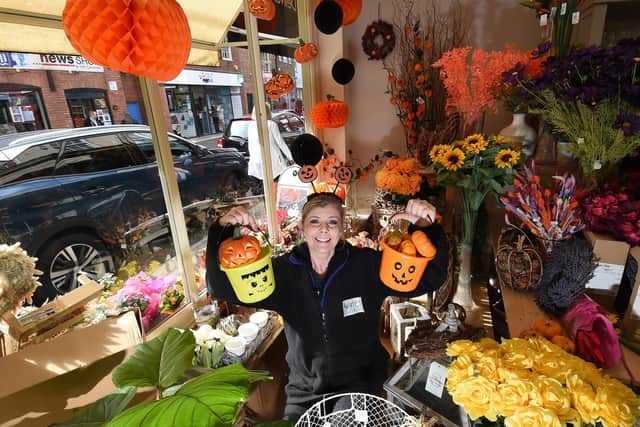 Mellissa Cross of Whites Florists taking part in the Lutterworth town centre scavenger hunt until October 31.
PICTURE: ANDREW CARPENTER