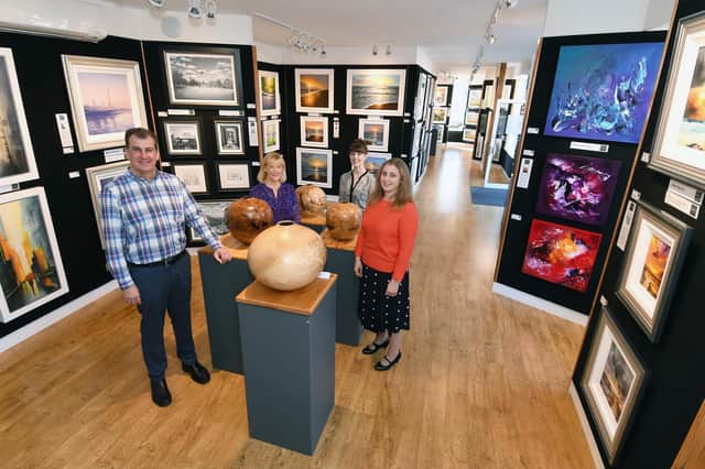 Andrew and Kathryn Cartwright with gallery staff members Sarah-May Johnson and Sally Tomkins at Wingates Gallery in Market Harborough.