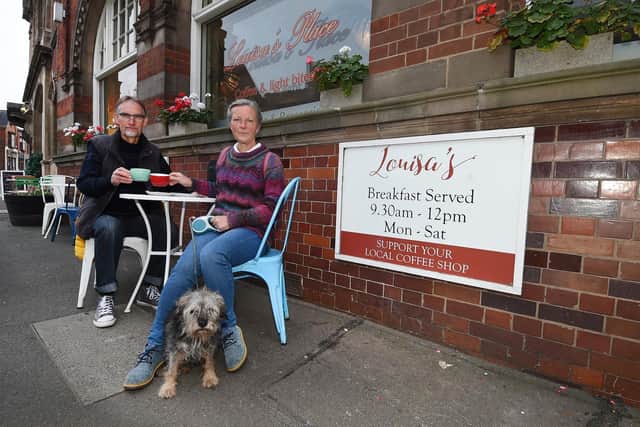 Campaigners Neil and Liz Adams with pet dog Monty 15 who is a regular at Louisa's Place.
PICTURE: ANDREW CARPENTER