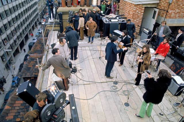 The Beatles preparing for their rooftop concert (picture: The Beatles: Get Back)