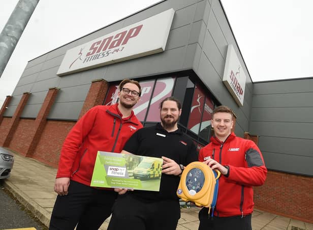Life saver...from left, Jason Samuel (assistant manager) Rhys Charlesworth (personal trainer) and Tom Claffey (general manager) with the defibrillator at Snap Fitness in Market Harborough.