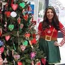 Chloe Goode, from Craft-I-Trims, who arranged the elf doors competition and the decoration of the market using customers handmade decorations, and Bridget Albano of Retail Genie.