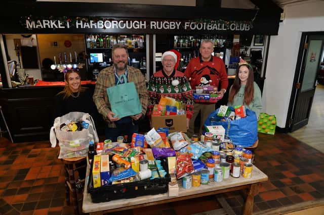 Annie Woodford, Gary Brewster (club house manager), Mike King (president), Tony Cochrane (membership secretary) and Hannah Stamp during the Market Harborough Rugby Club and Harborough Athletics Club event to raise awareness of the foodbank in Harborough, when they turned the clubhouse into a collection point.
PICTURE: ANDREW CARPENTER