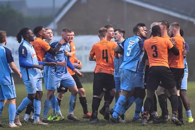 Tempers flare during Lutterworth Town’s 1-0 home defeat to Rugby Town last weekend. Picture by Martin Pulley