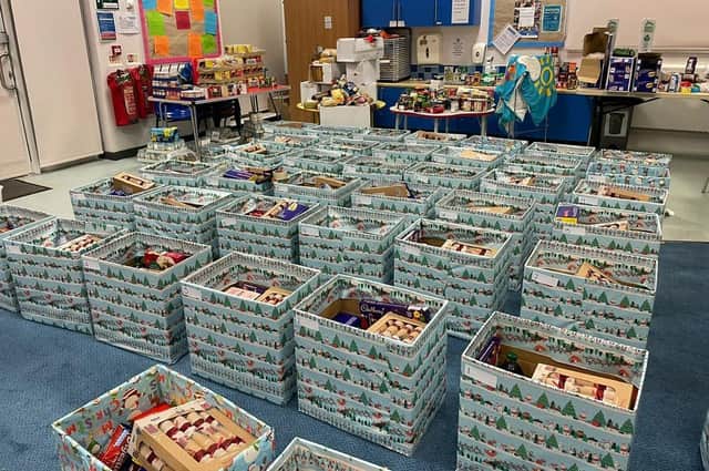 Hampers with everything from Christmas dinner ingredients to children’s books and gifts were handed out to families in Harborough and across Leicestershire for the festive season.