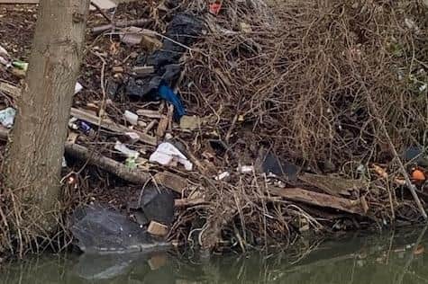 Fly-tippers have dumped a mountain of “disgusting” rubbish by the well-used scenic canal on the edge of Market Harborough.