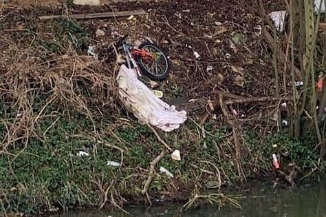 Canal and River Trust chiefs have today blasted fly-tippers who have piled up a stack of rubbish by the canal in Market Harborough.