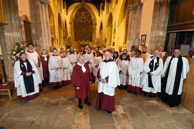 Barbara and David Johnson with (far right) The Very Revd David Monteith, Dean of Leicester with the Senior Girls and Songmen of Leicester Cathedral Choir, joined by Dionysius Church Choir.
PICTURE: ANDREW CARPENTER