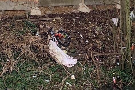 The domestic and industrial waste – which included a bike – was dumped by the side of the canal.