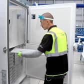 Movinato team member at the ultra low temperature freezers for the Pfizer BioNTech Covid-19 vaccine